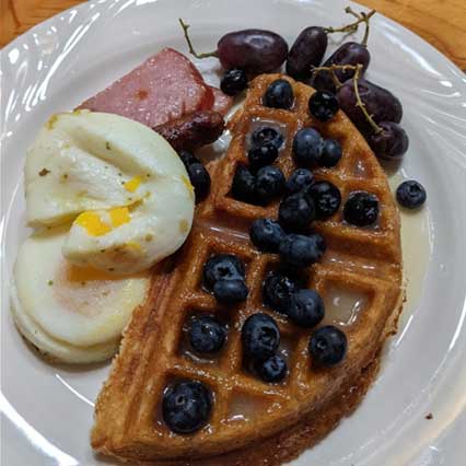 breakfast waffle blue berries eggs